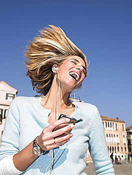 Similar – Cheerful woman in yellow jacket