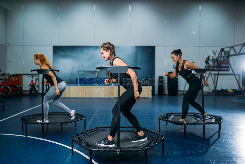 Similar – Image, Stock Photo Couple legs over steppers training in aerobic class