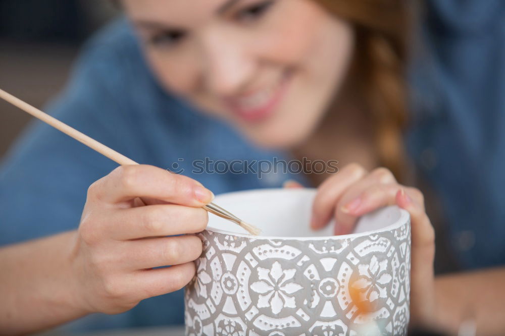 Similar – Crop woman eating sushi