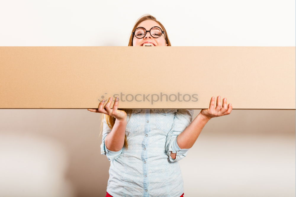 Similar – Moving boxes, Woman with boxes