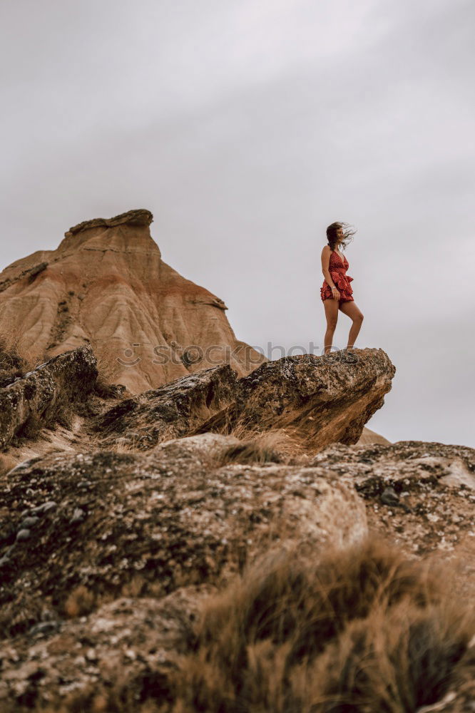 Similar – Image, Stock Photo Couple of climbers walking with crash pads at the coast