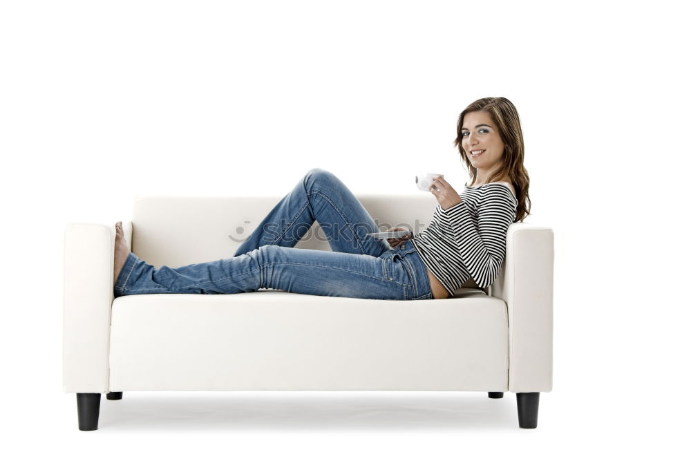 Similar – young, tall, leggy woman sits barefoot on a light couch