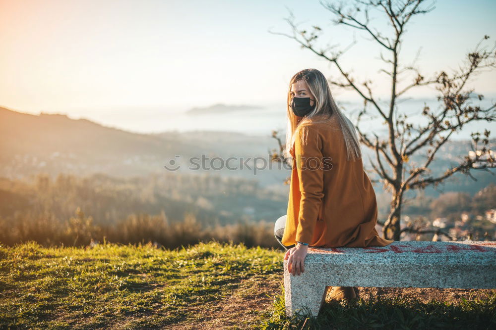 Similar – Young woman on a swing on a playground