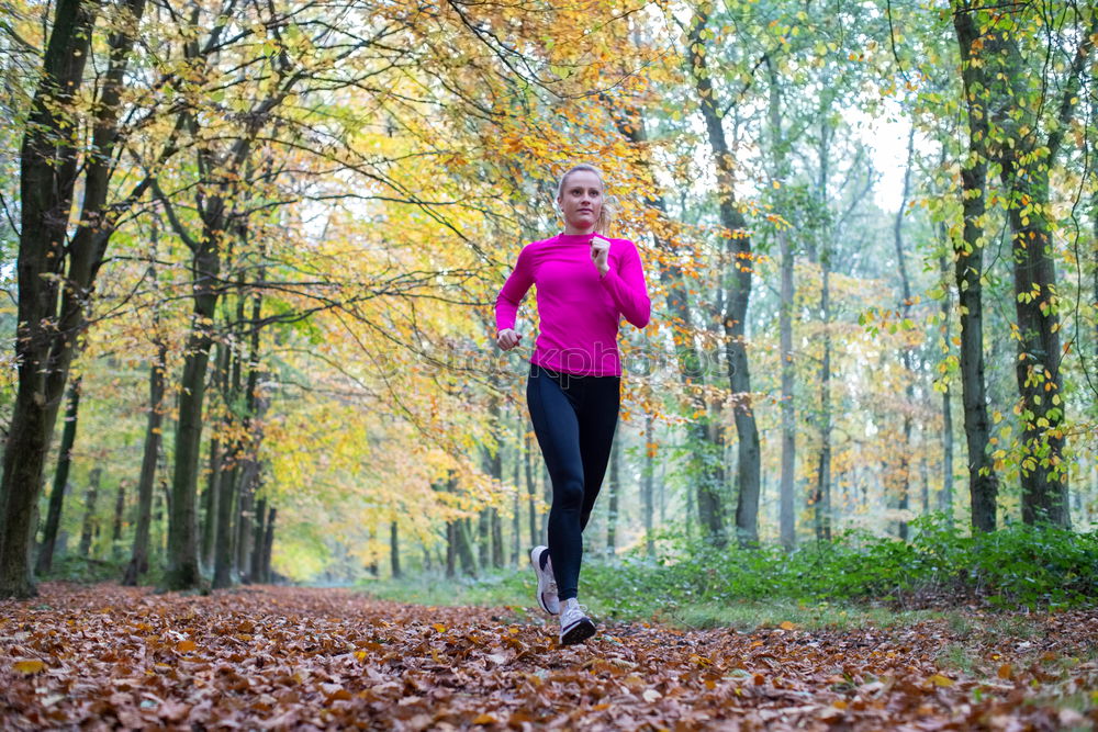 Image, Stock Photo Pretty fit young woman jogging in woodland