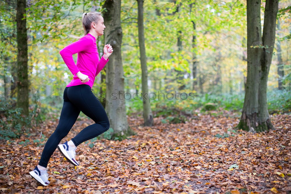 Similar – Image, Stock Photo Pretty fit young woman jogging in woodland