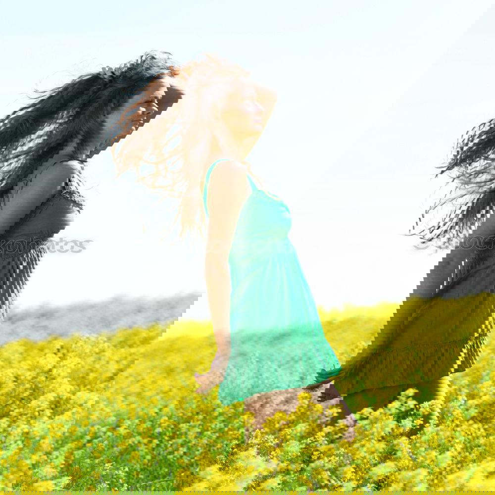 Similar – Image, Stock Photo Young woman with yellow dress and hat walks in the countryside.