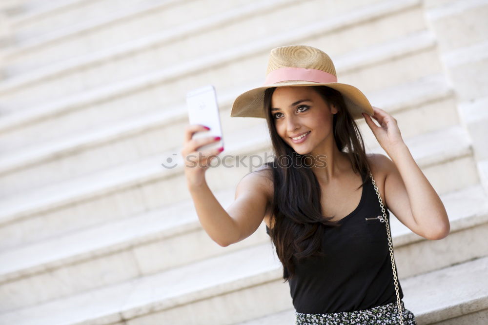Similar – Image, Stock Photo Young African girl walking on the street looking at her smartphone.