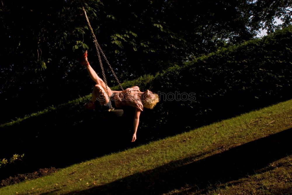 Similar – Child bouncing on a trampoline