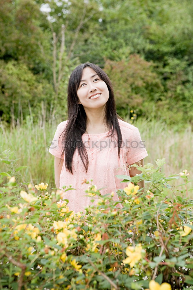 Similar – portrait of happy asian girl in nature