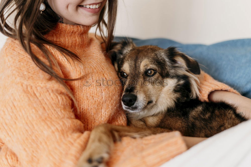 Similar – A pretty girl hugs her pet while kissing her