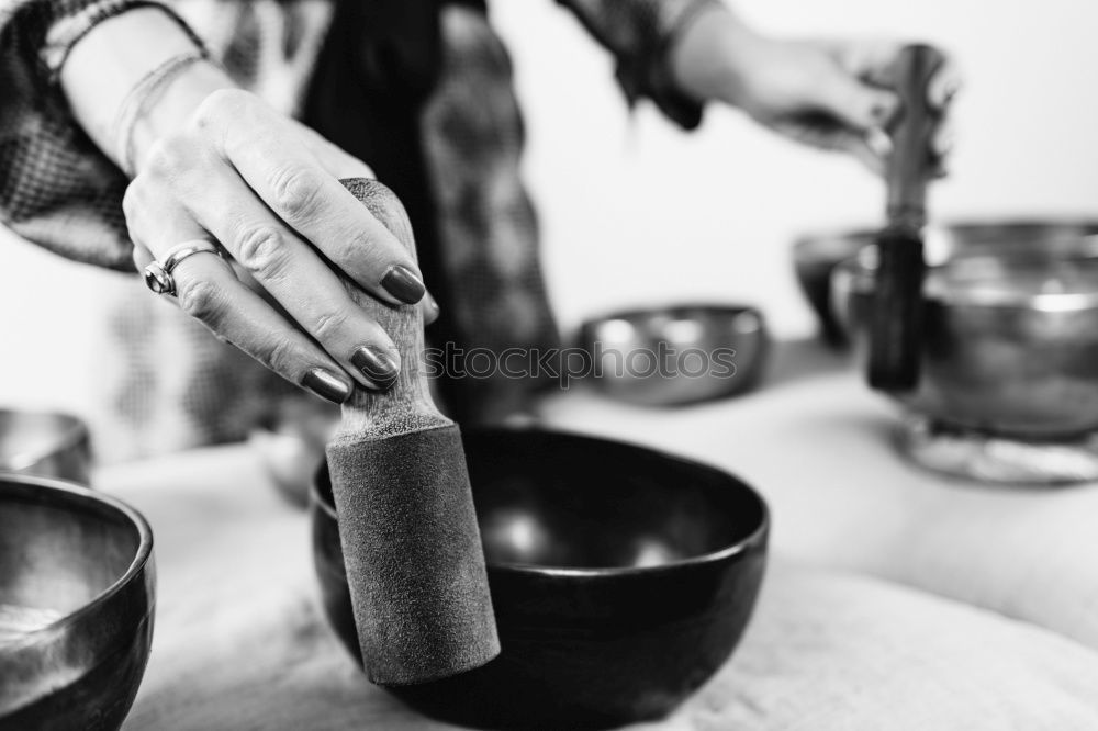 Image, Stock Photo Hand playing yoga bowls outdoors.