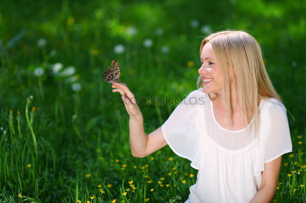 Similar – Woman with a sign in the park