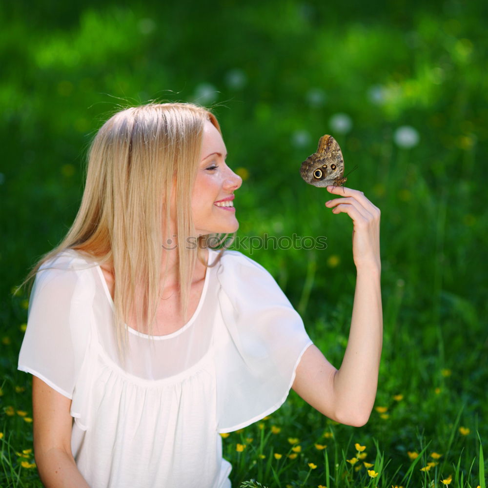 Similar – Woman with a sign in the park