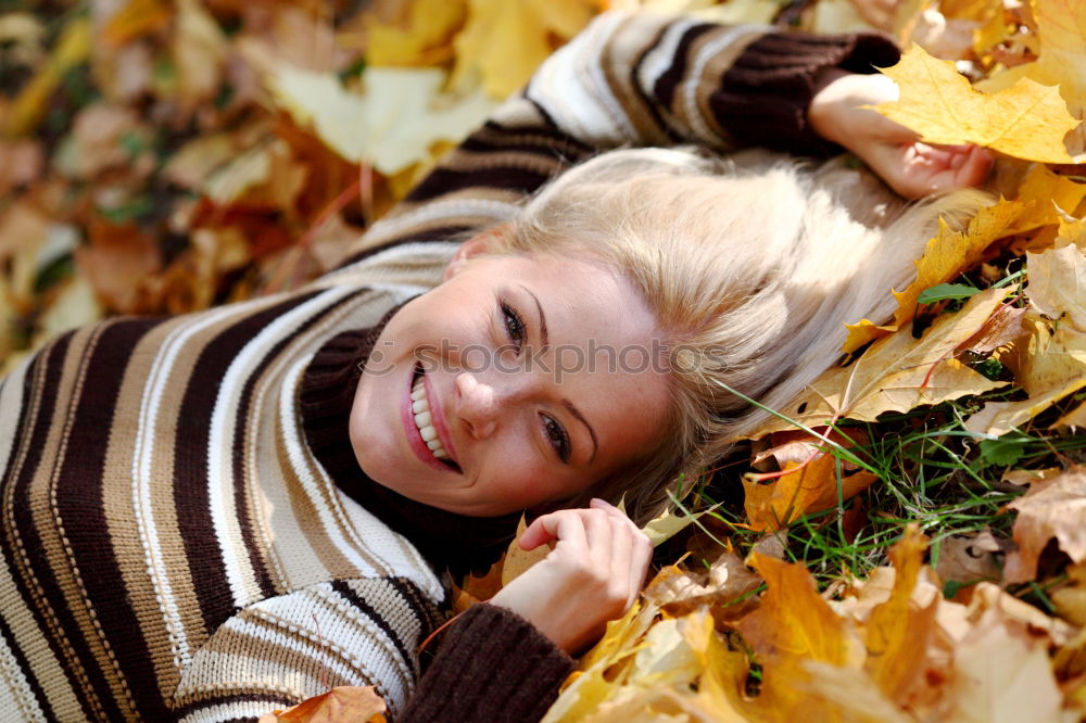 Similar – Children hands hold a yellow maple leaf