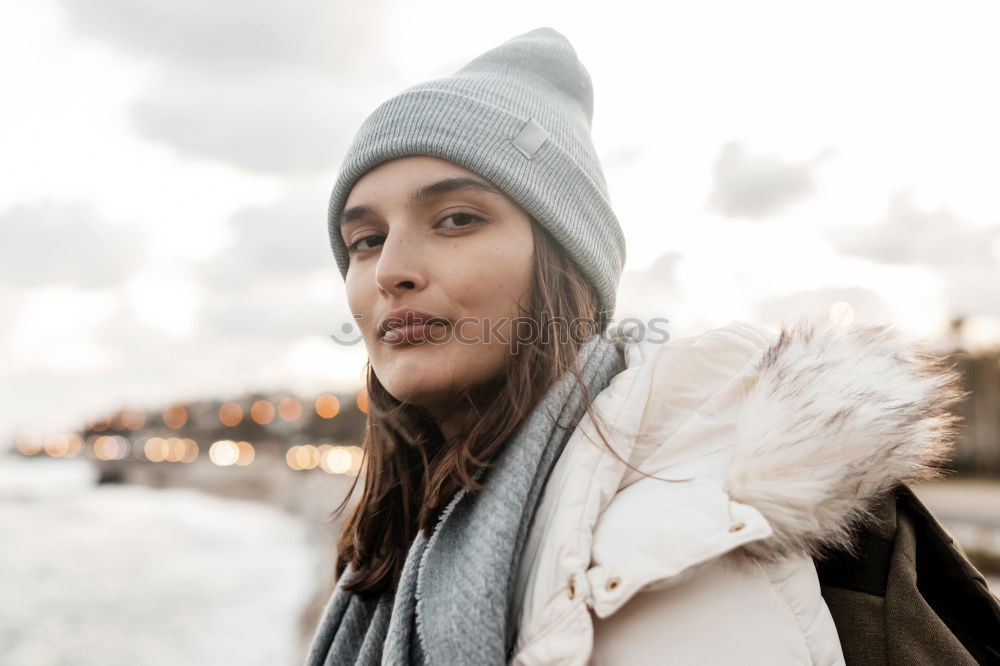 Similar – Woman standing on the street