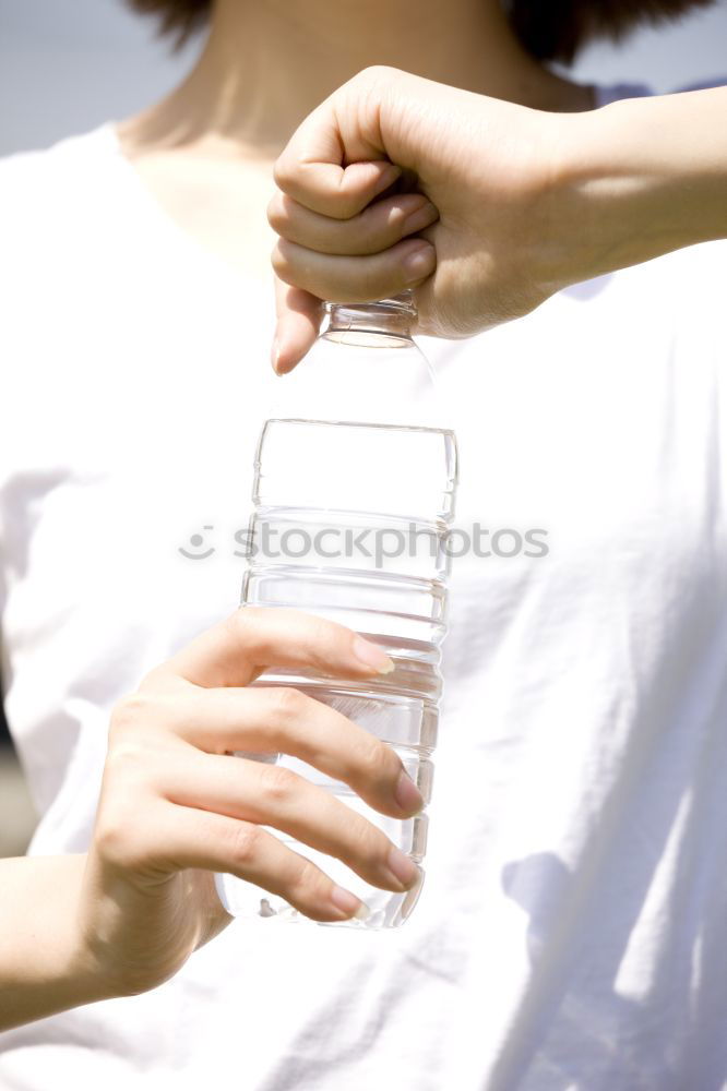 Similar – Boy holding vase with water near face