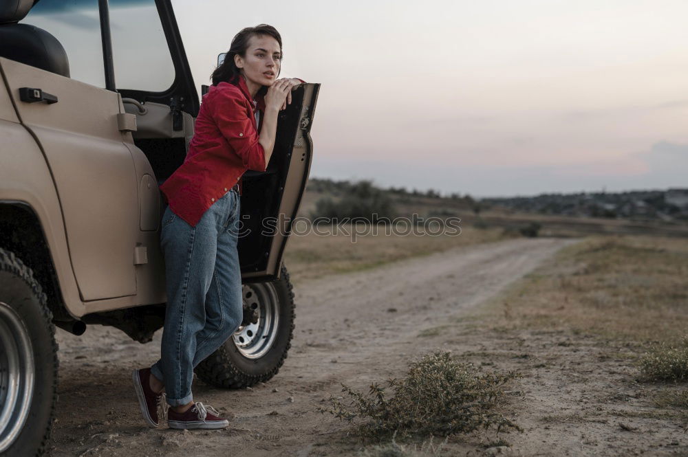 Similar – Image, Stock Photo Tourist leaning on car roof