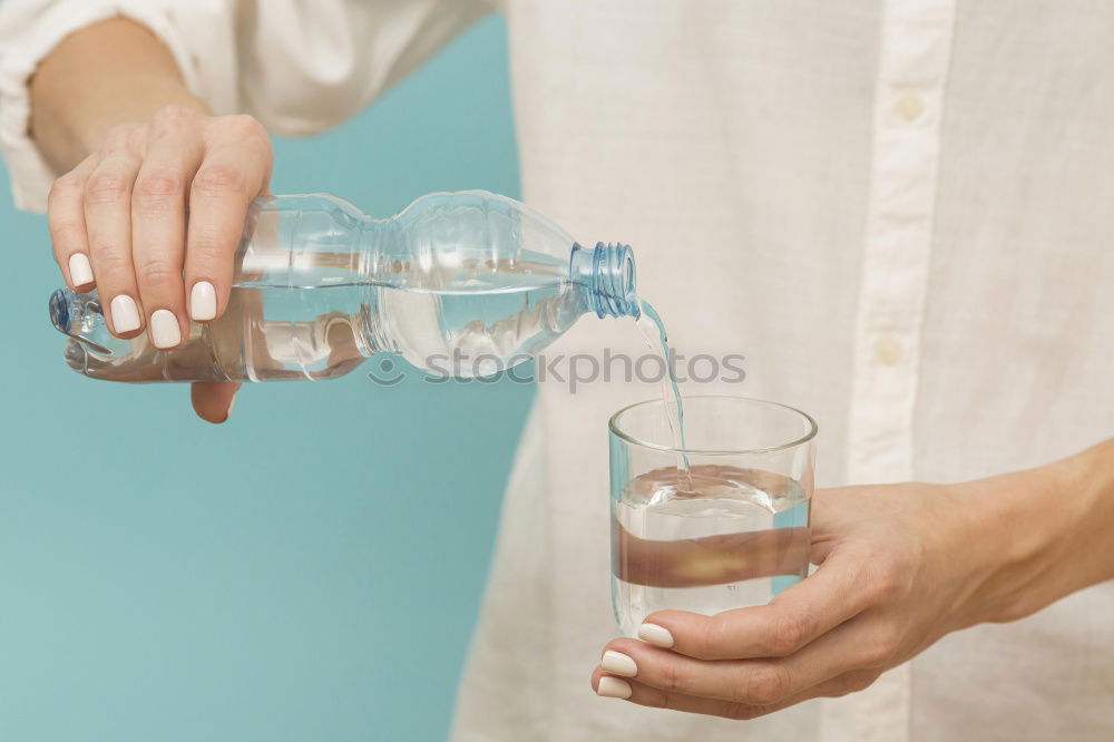 Similar – Boy holding vase with water near face