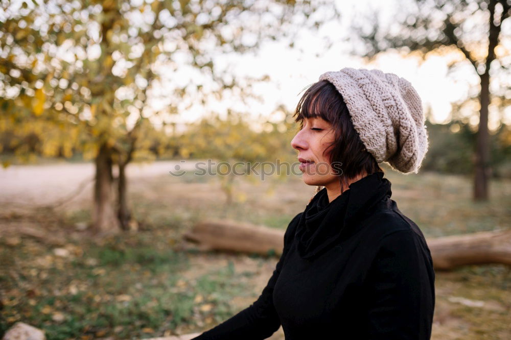 Similar – Pretty Asian woman sitting at pond