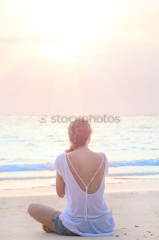 Similar – Image, Stock Photo Young woman practicing yoga by sea