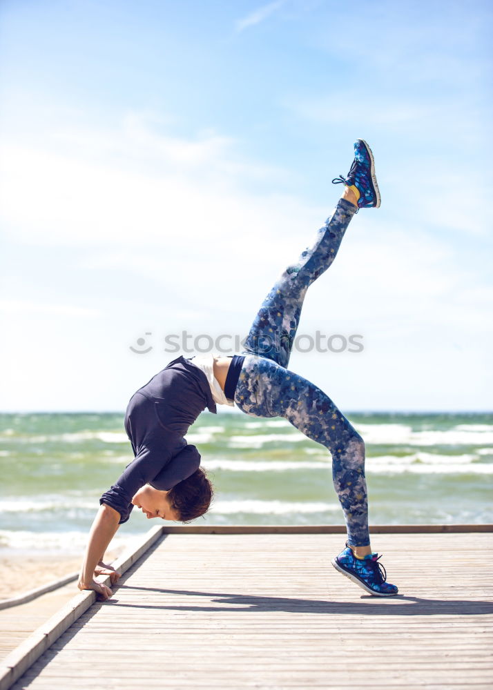 Similar – Black fit woman doing fitness acrobatics