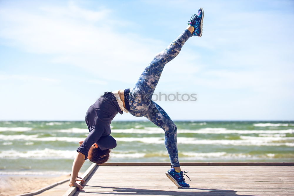 Image, Stock Photo African American woman doing yoga exercise on beach