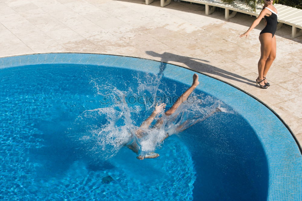 Similar – Image, Stock Photo Woman legs in a swimming pool with lifesaver