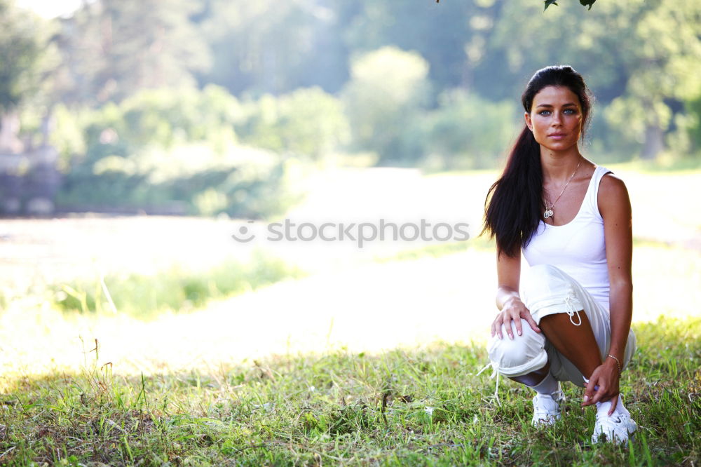 Similar – Image, Stock Photo sports woman doing lawn exercises and stretching on the grass outdoor in a park listening music