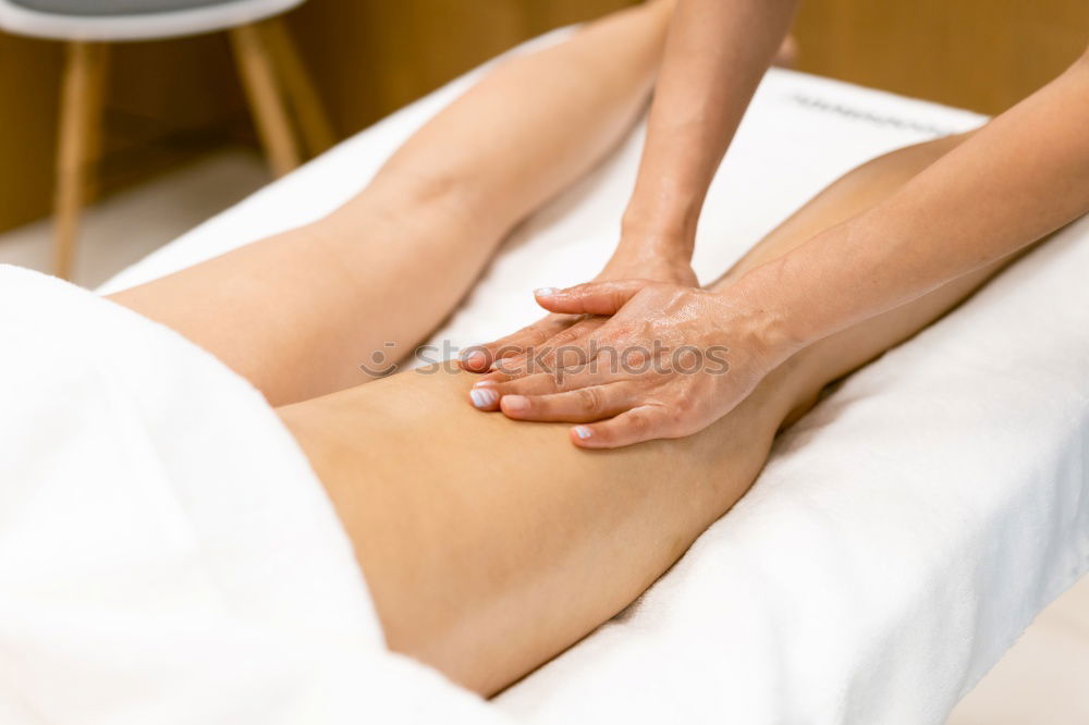 Similar – Image, Stock Photo Woman receiving massage on shoulders in clinical center