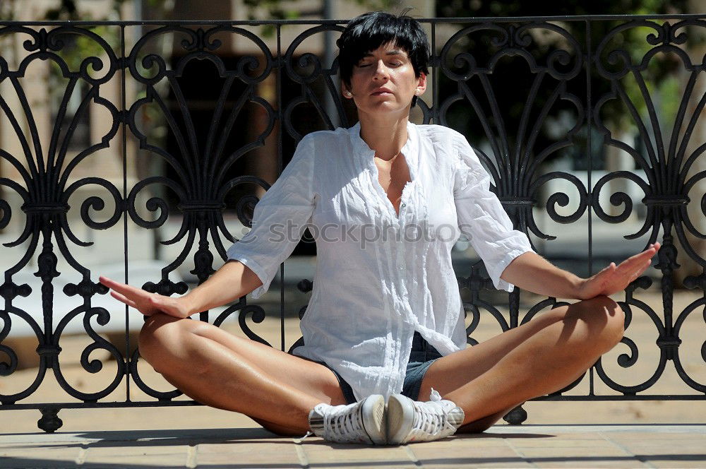 Similar – Image, Stock Photo Black woman, afro hairstyle, doing yoga on promenade.