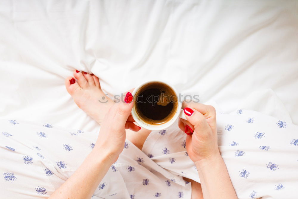 Similar – Image, Stock Photo Cup of coffee and spoon on wooden tray in bed on white sheets