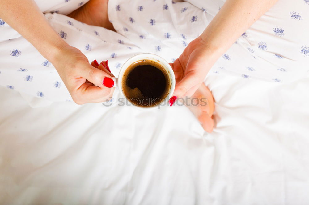 Similar – Image, Stock Photo Cup of coffee and spoon on wooden tray in bed on white sheets