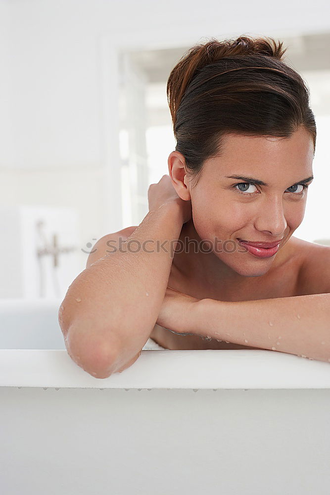 Similar – Young woman reacting in shock under shower