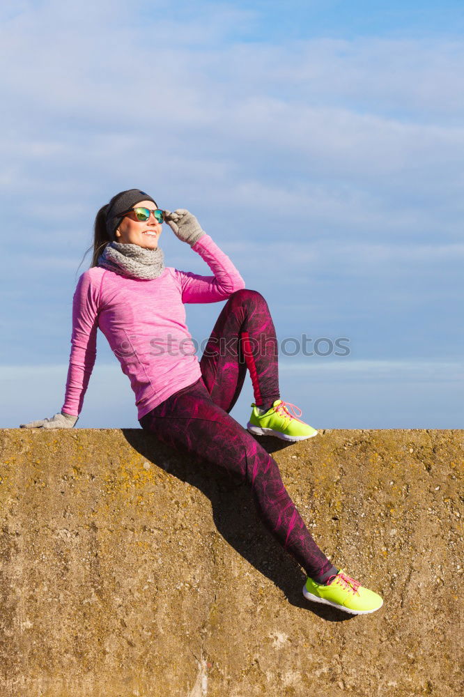 Similar – Image, Stock Photo blonde woman sitting in the grass and stretching in a park