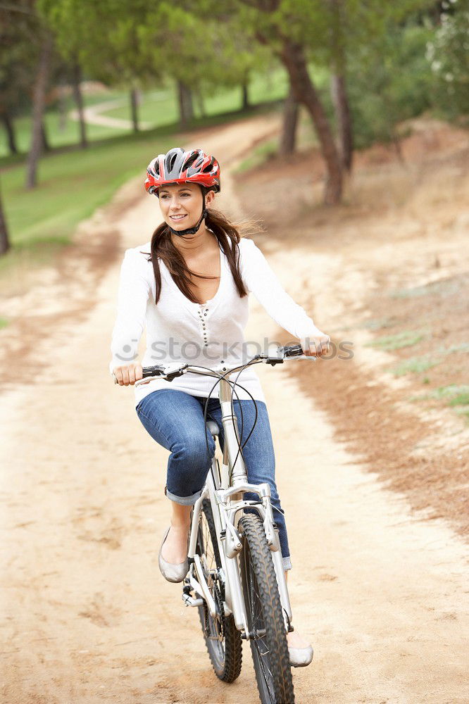 Similar – Image, Stock Photo Young sexy blonde girl is standing near the bicycle