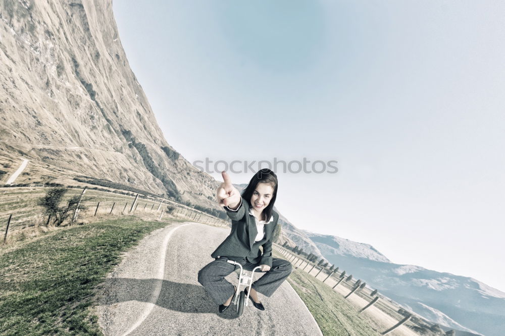 Similar – Man in summer outfit skating on road near sea.