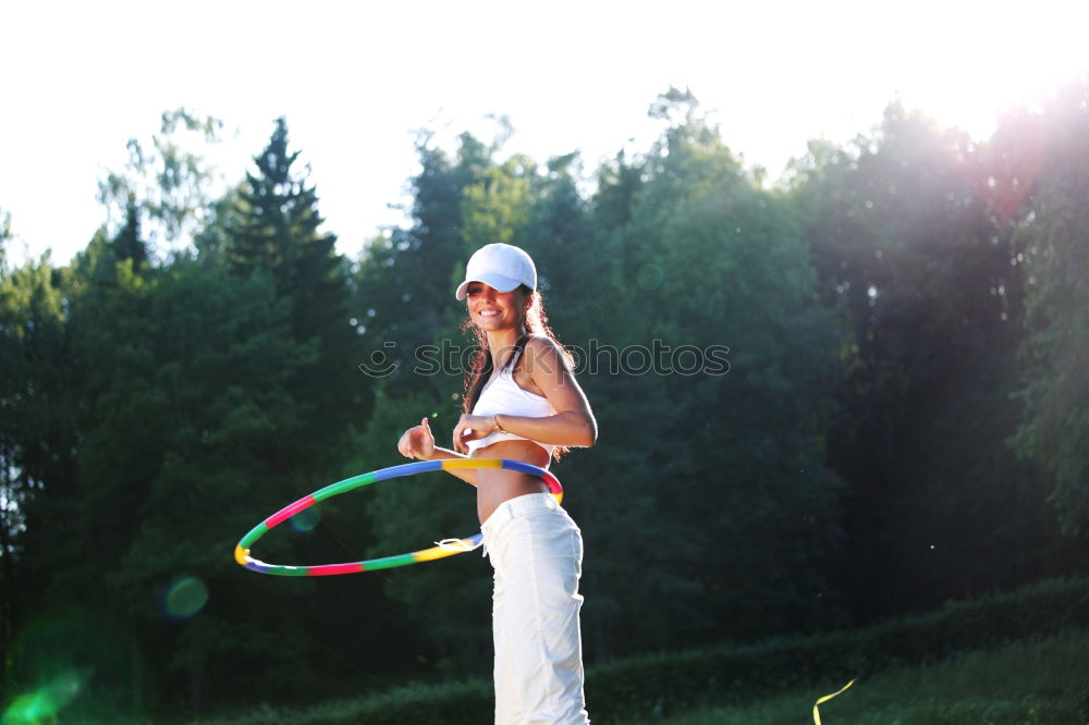 Similar – Child bouncing on a trampoline