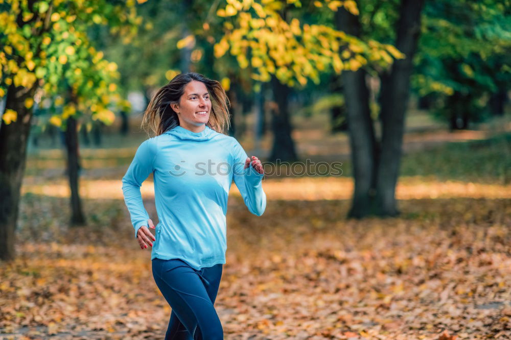 Similar – Image, Stock Photo Pretty fit young woman jogging in woodland