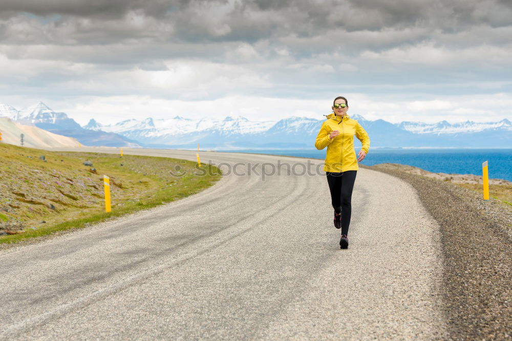 Similar – Woman jogging in countryside