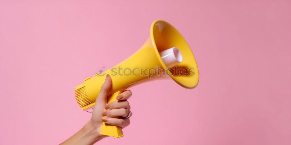 Similar – Female hand holding megaphone