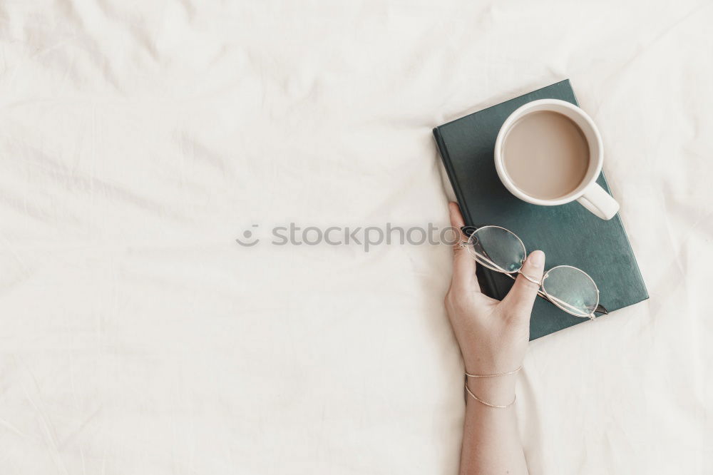 Similar – dog on bed with white sheets and alarm clock