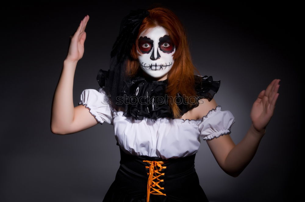 Similar – young woman in halloween costume