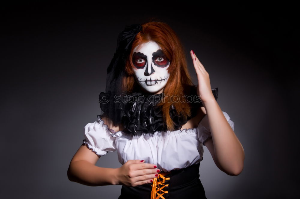 Similar – young woman in halloween costume