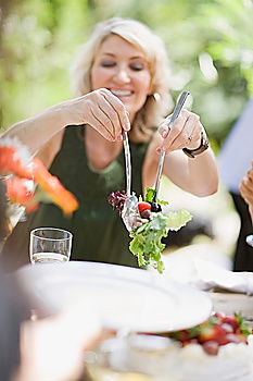 Similar – Group of People enjoying food and wine at restaurant