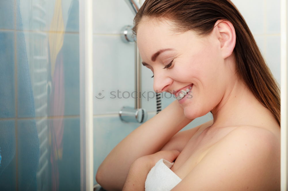 Similar – Young woman reacting in shock under shower