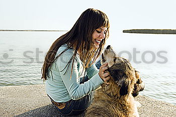 Similar – Foto Bild Schmusen. Hund Frau