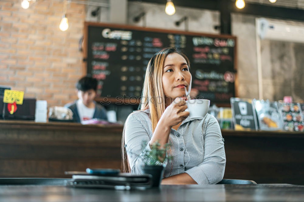 Similar – Young man receiving coffee at café