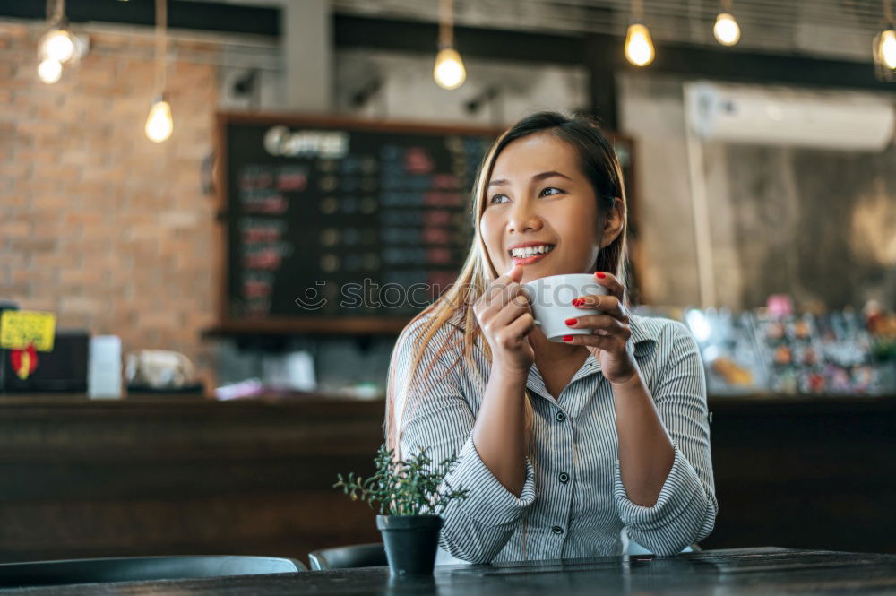 Similar – Young man receiving coffee at café