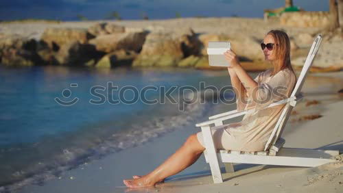 Similar – Image, Stock Photo Middle aged woman seated in a table of a restaurant near the sea