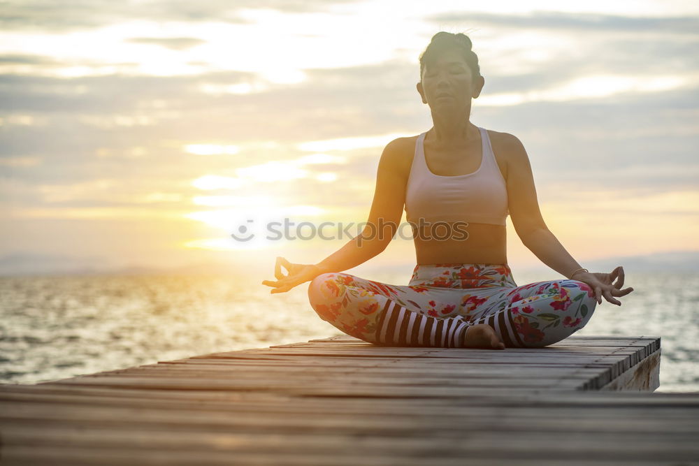 Similar – Black woman, afro hairstyle, doing yoga in the beach with eyes closed